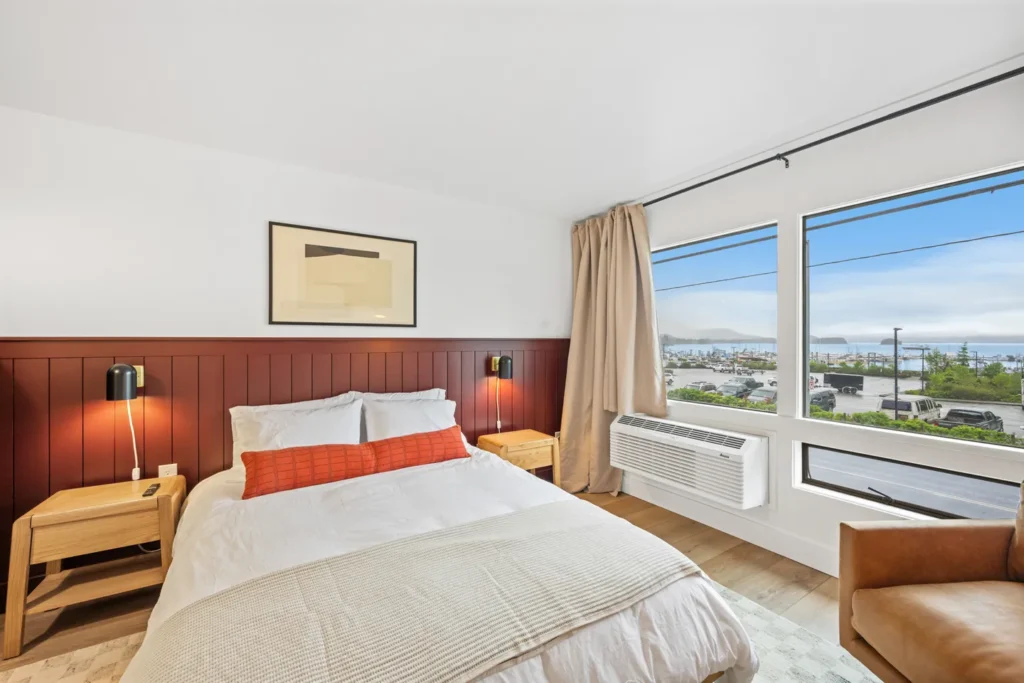 Cozy hotel room with ocean view window