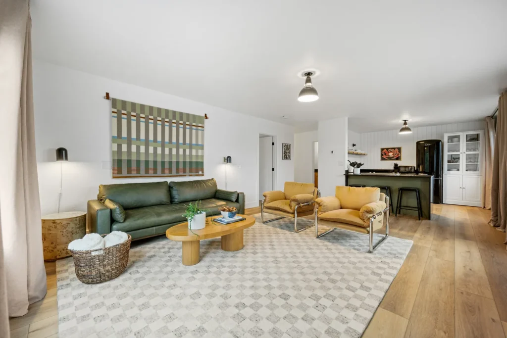 Modern living room with kitchen and cozy decor