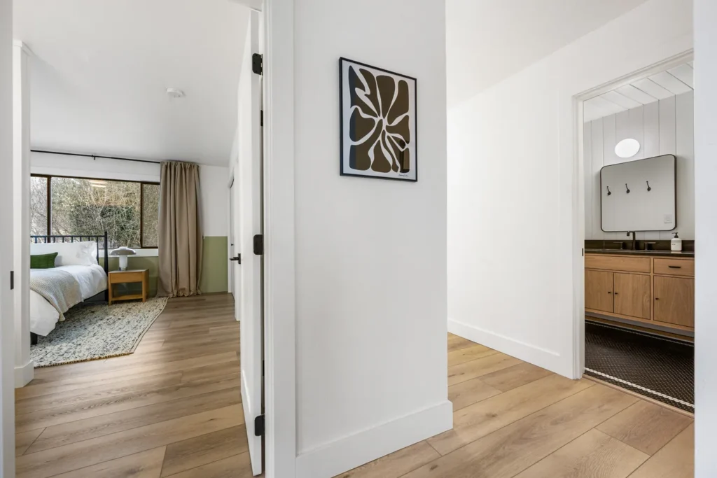 Modern hallway leading to bedroom and bathroom