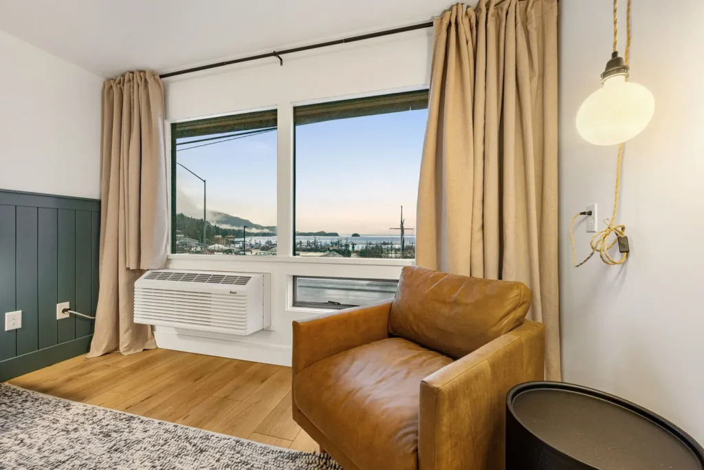 Cozy room with leather chair and ocean view