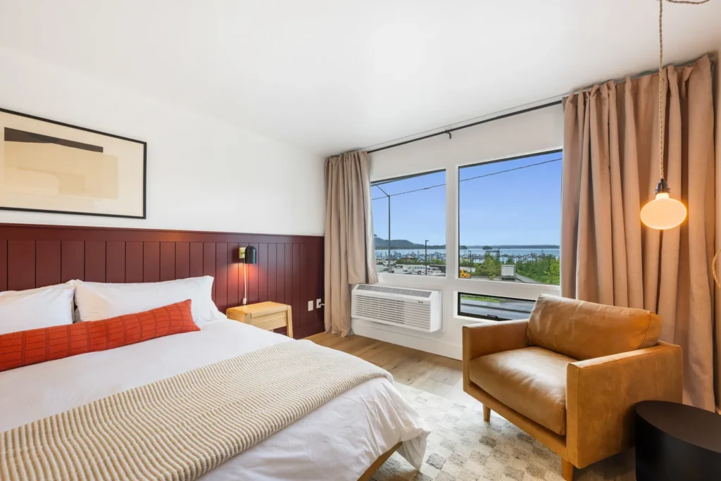 Cozy hotel room with ocean view window