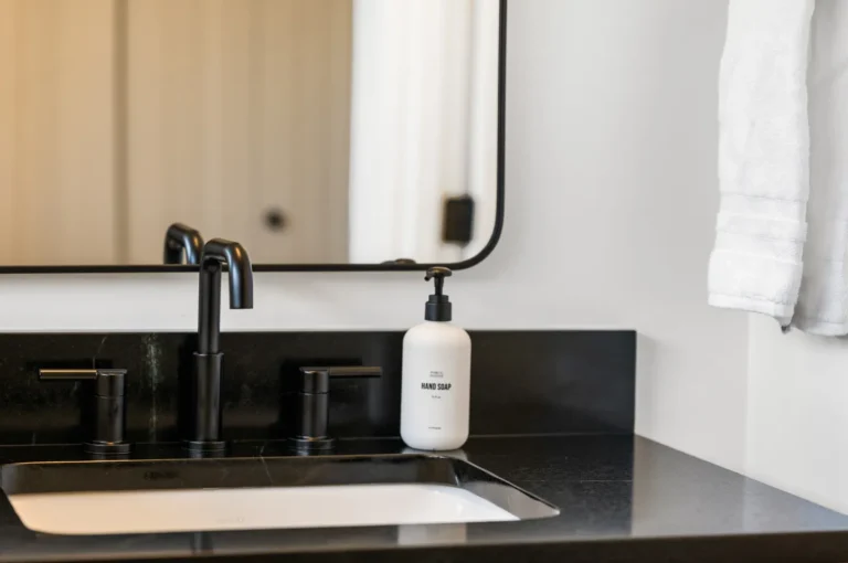 Modern bathroom sink with hand soap dispenser