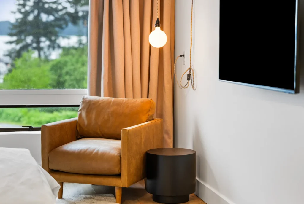 Cozy reading corner with leather armchair and lamp